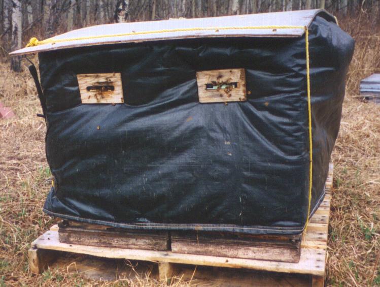 Wintering hive wrap made with an insulated tarp